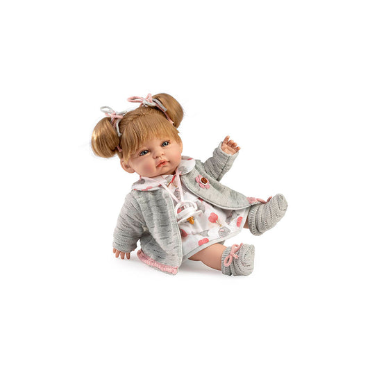 Muñeca Baby Coral con abriguito gris – 34 cm